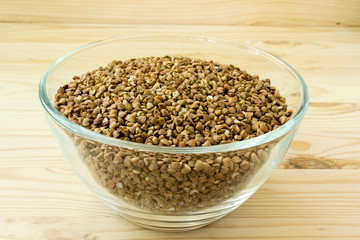 Buckwheat on wooden background