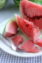 Sliced watermelon on plate closeup