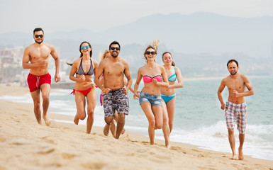 People running at beach