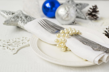 Christmas and New year table place setting with christmas decora