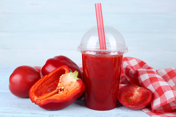 Fresh juice mix fruit and vegetables, healthy drinks on wooden table, on light background