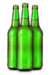 Set of beer's bottles with frosty drops isolated