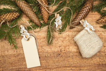 Christmas fir tree on wooden background