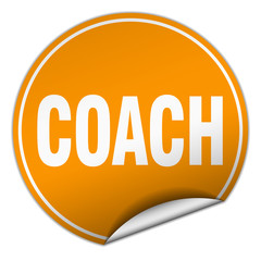coach round orange sticker isolated on white