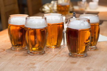 Beers on the wooden table ready for tasting