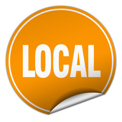 local round orange sticker isolated on white