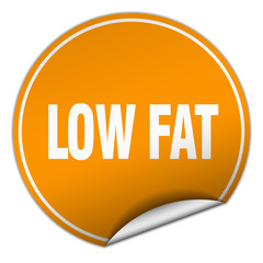 low fat round orange sticker isolated on white