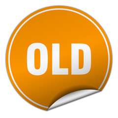 old round orange sticker isolated on white
