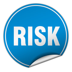 risk round blue sticker isolated on white