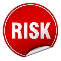 risk round red sticker isolated on white