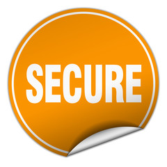 secure round orange sticker isolated on white