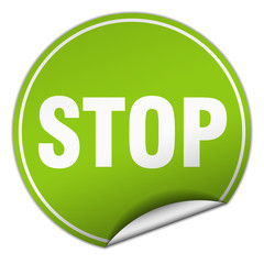 stop round green sticker isolated on white