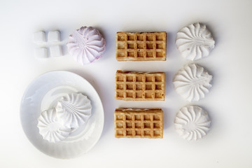 Waffles and marshmallows top view,  food