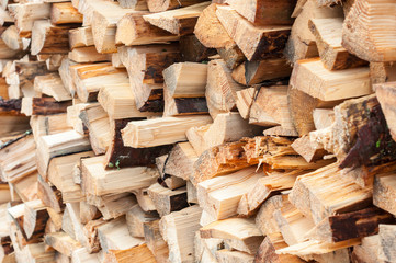 firewood.  Dry firewoods in a pile for furnace kindling