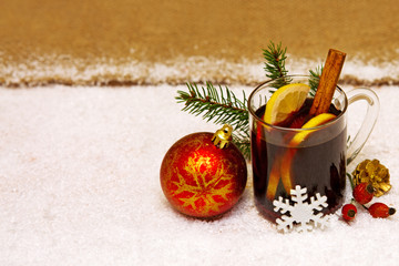 Christmas mulled wine and red ball.