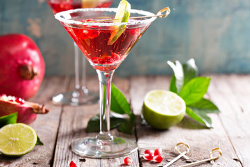 Pomegranate martini with lime - obrazy, fototapety, plakaty