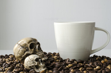 Skull on coffee bean and coffe cup
