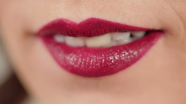 Sexy woman lips with red makeup and gloss