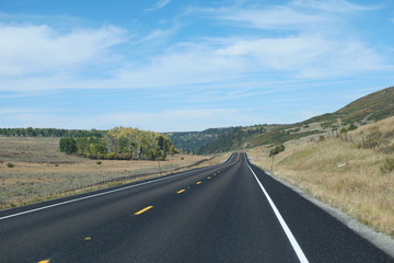 an empty american road in colorado , usa