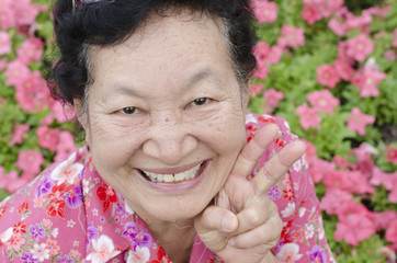 Portrait of asian elderly at the park