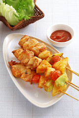 chicken and vegetable barbeque in ceramic dish
