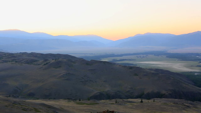 Panorama of Kuray mountain range and North Chuya ridge at dawn.