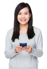 Fototapeta premium Young Woman use of the mobile phone
