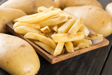 french fries on wood background