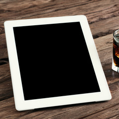 White tablet computer with a blank screen