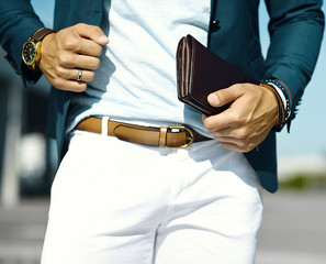 Fashion portrait of young businessman handsome model man in casual cloth suit with accessories on...