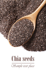 Chia seeds macro in a spoon isolated on a white. vertical top view

