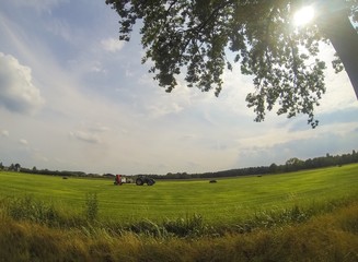 Fototapeta premium sun over a farmer