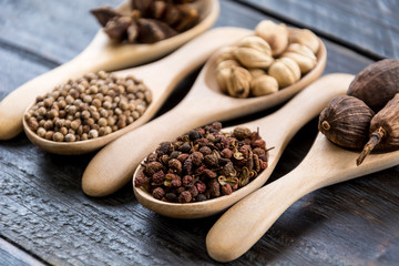 Spices and herbs in  bowls.