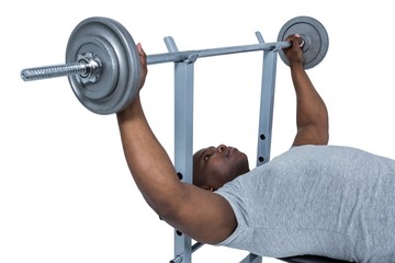 Fototapeta premium Fit man exercising with barbell 