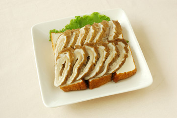 Pork intestine with spiced soy sauce. chinese cuisine. chinese food cold dish. yumcha.
