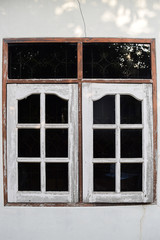 wooden window with black glass