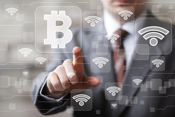 Businessman pressing sign button web bitcoin icon wifi