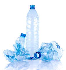 Whole and crushed plastic bottles