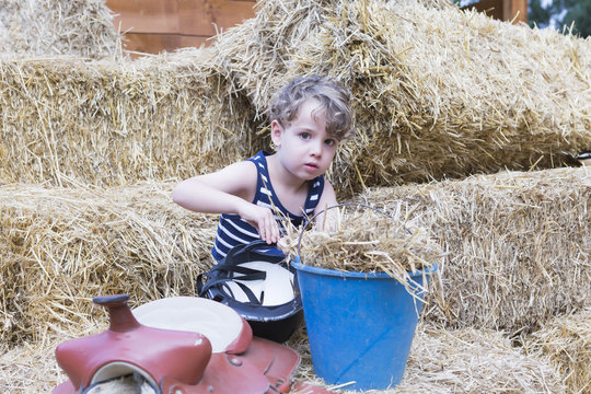 young rider in the hay bales