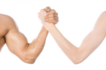 Bodybuilding & Fitness Topic: arm wrestling thin hand and a big strong arm isolated on white background in studio - obrazy, fototapety, plakaty