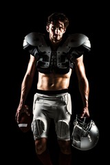 Fototapeta na wymiar Composite image of shirtless american football player