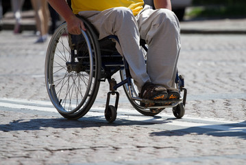 Disabled Man Sitting On Wheelchair