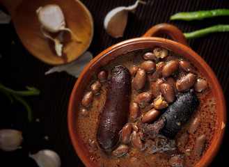 Spanish fabada with Black pudding and sausage in an earthenware