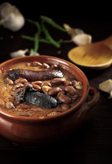 Spanish fabada with Black pudding and sausage in an earthenware