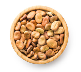 dried broad beans in wooden bowl