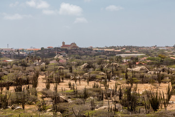 Fototapeta na wymiar Aruba Desert with Church in Background