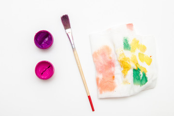 Naklejka premium two open gouache colors with brush and palette