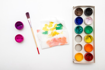 open paintbox   gouache colors with brush and palette