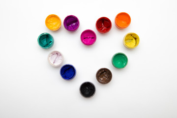 heart made of open gouache colors on white