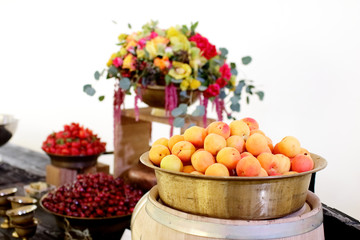 Naklejka na ściany i meble fruit on the table in a deep bowl